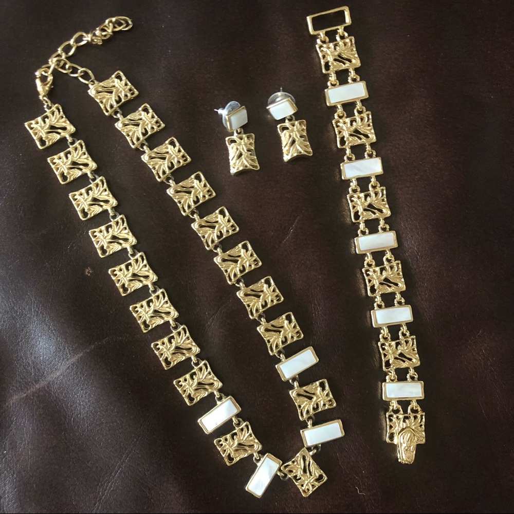 Exotic gold tone/mother of pearl set